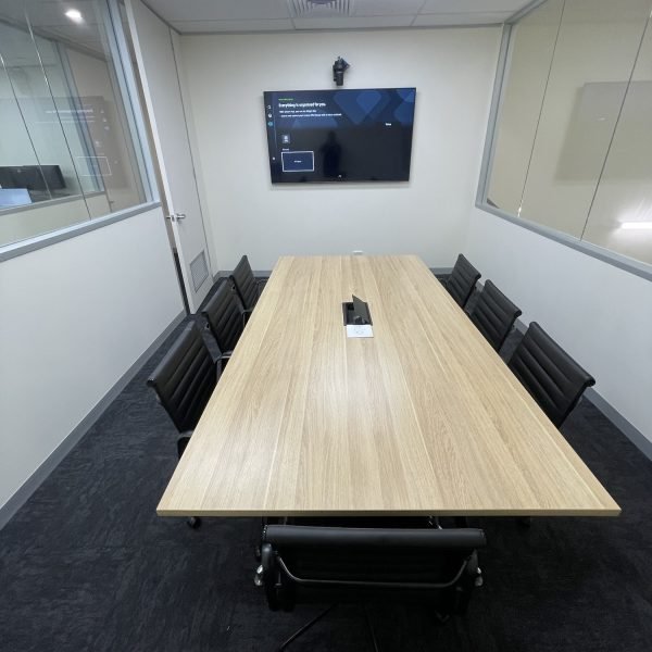 Flat-screen TV mounted on drywall in residential home